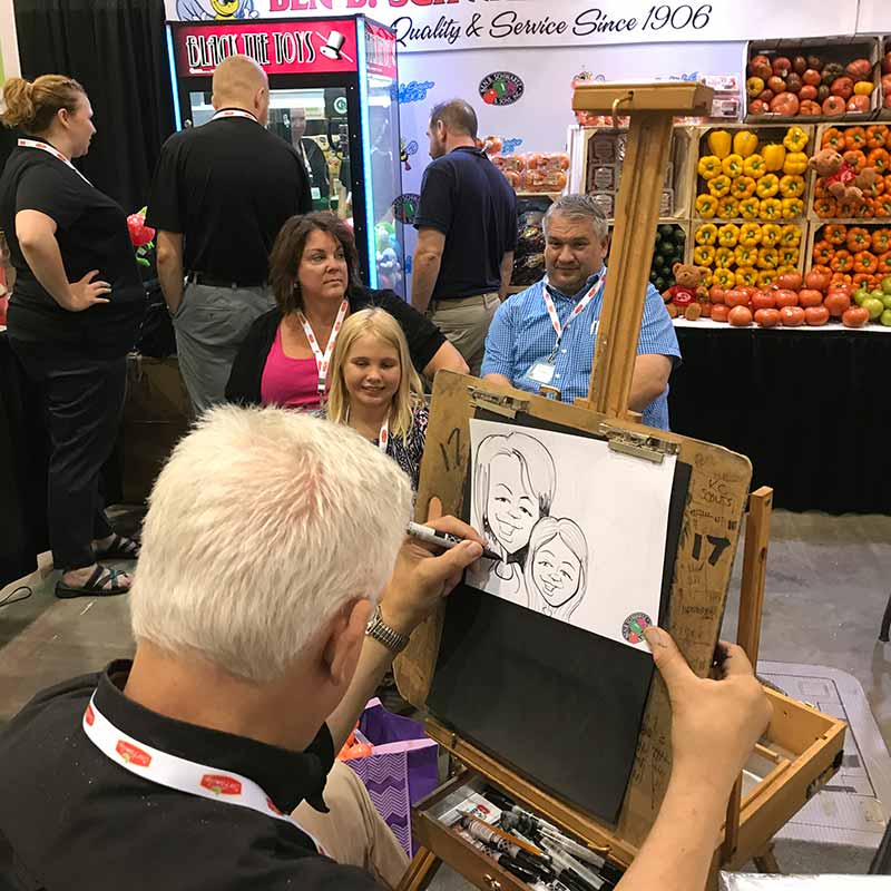 caricature artist at trade show
