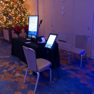 Court's digital caricature art setup at a reception
